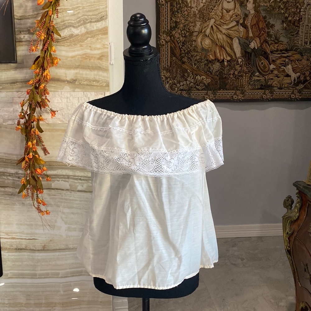White off the shoulder peasant blouse.